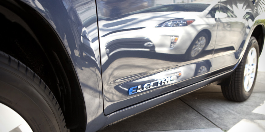Car with the word Electric on the side.